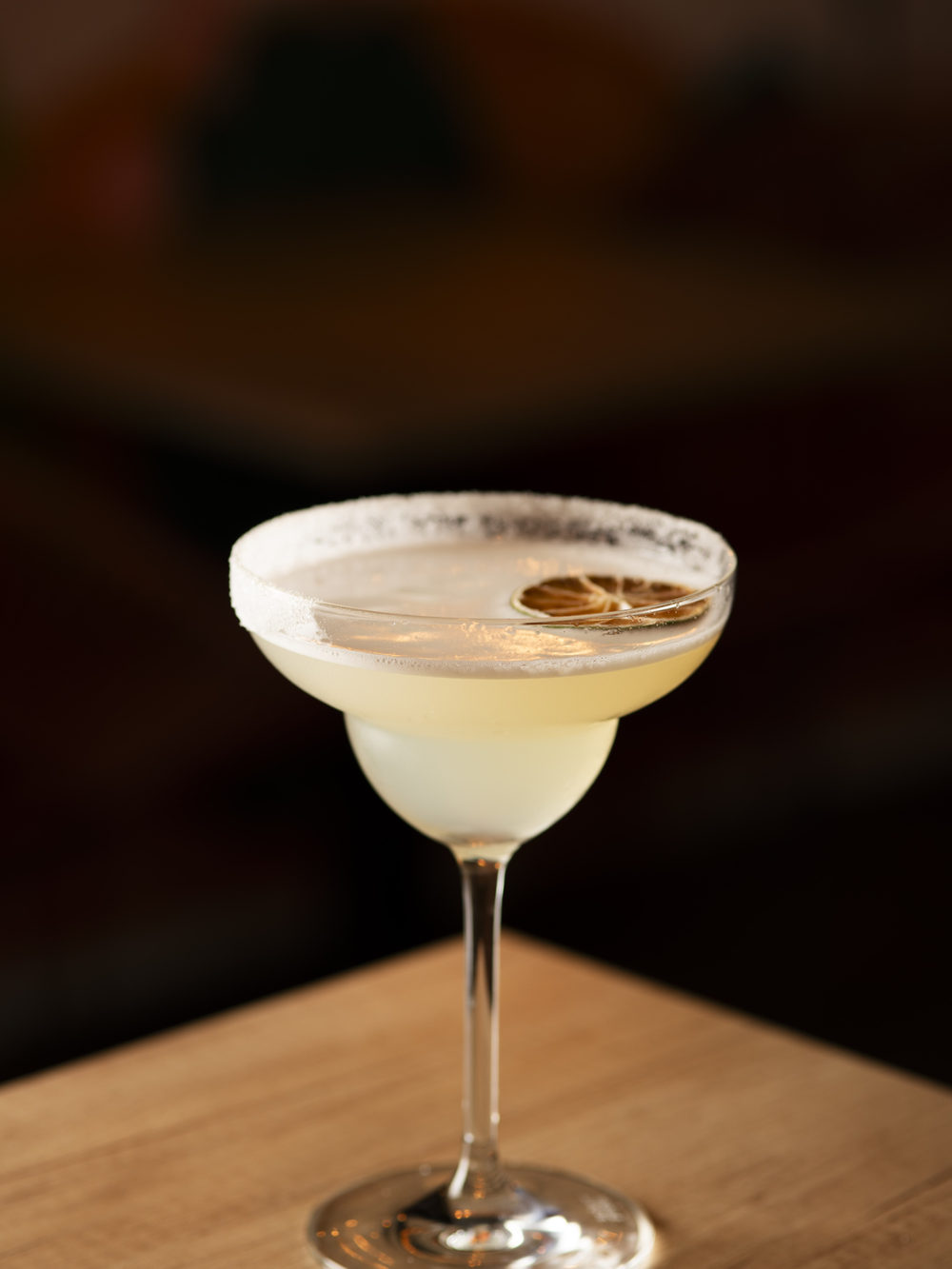 Margarita, copa escarchada y rodaja deshidratada